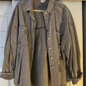 Distressed denim jacket